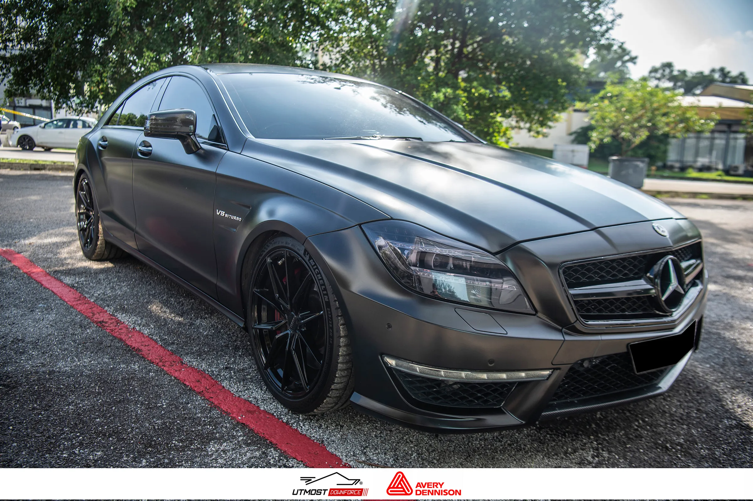 A car wrapped in Satin Obsidian Black, Satin film by Avery Dennison