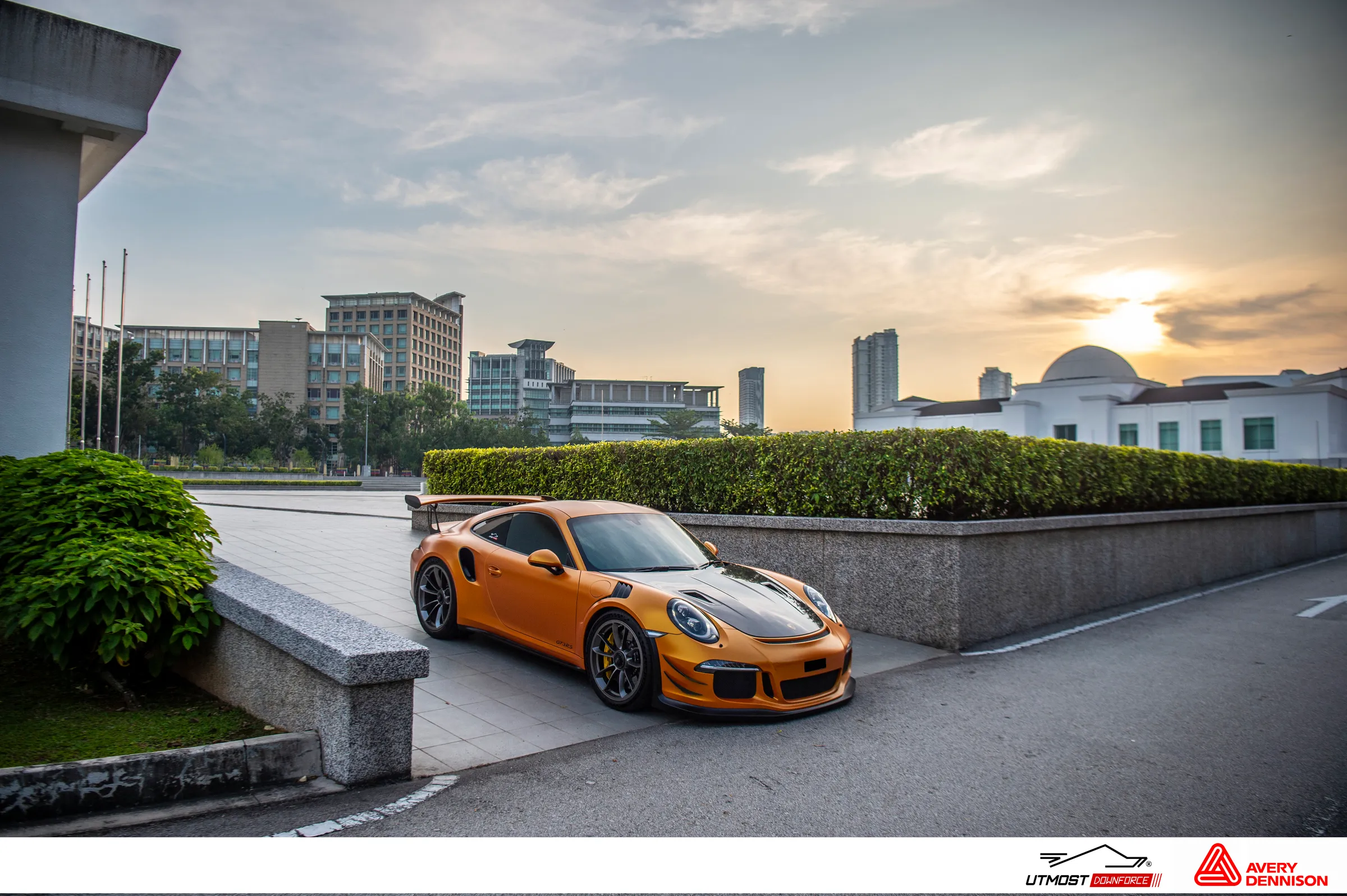 A car wrapped in Satin Stunning Orange, Satin film by Avery Dennison