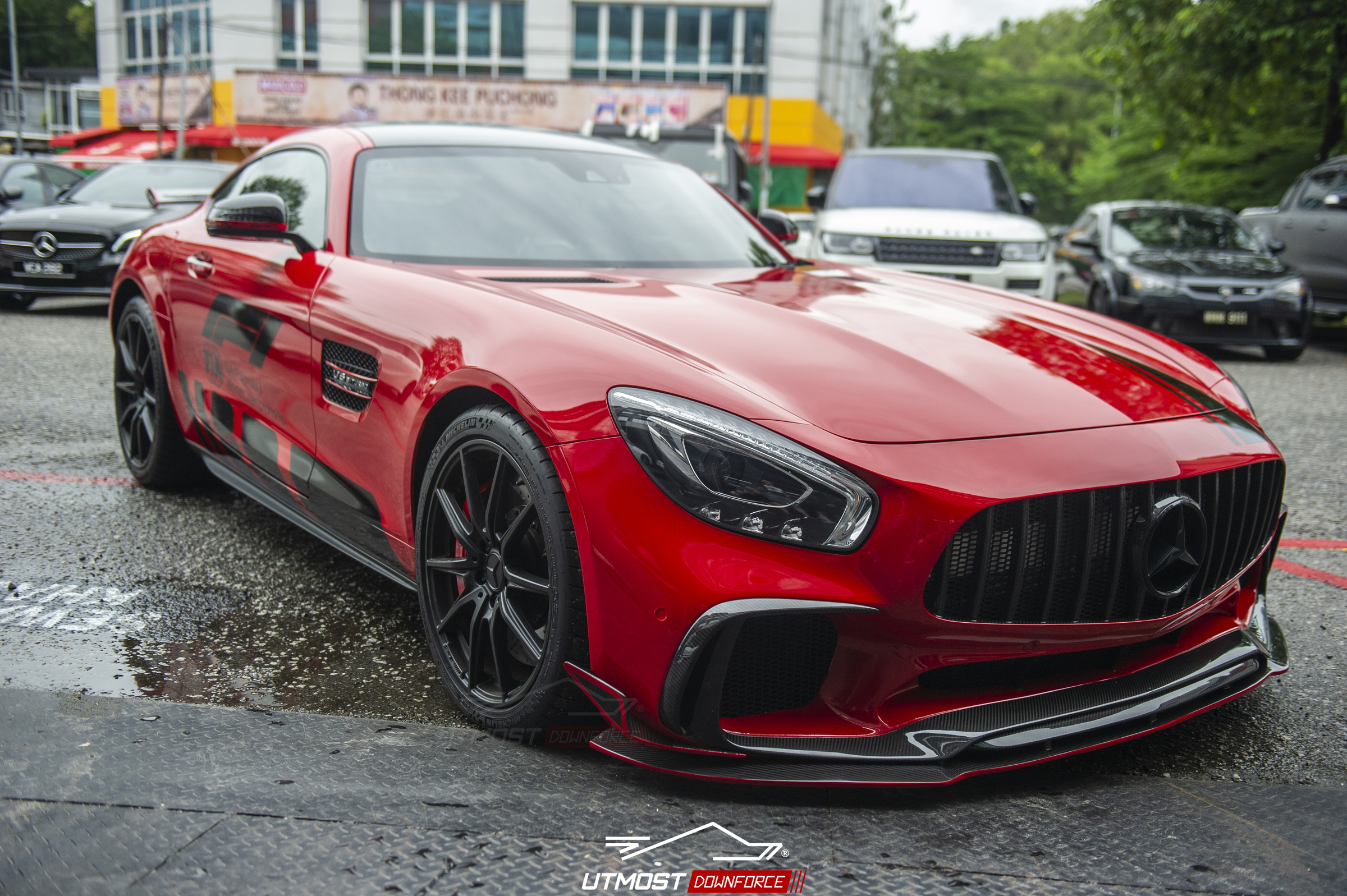 A car wrapped in Gloss Carmine Red, Gloss film by Avery Dennison