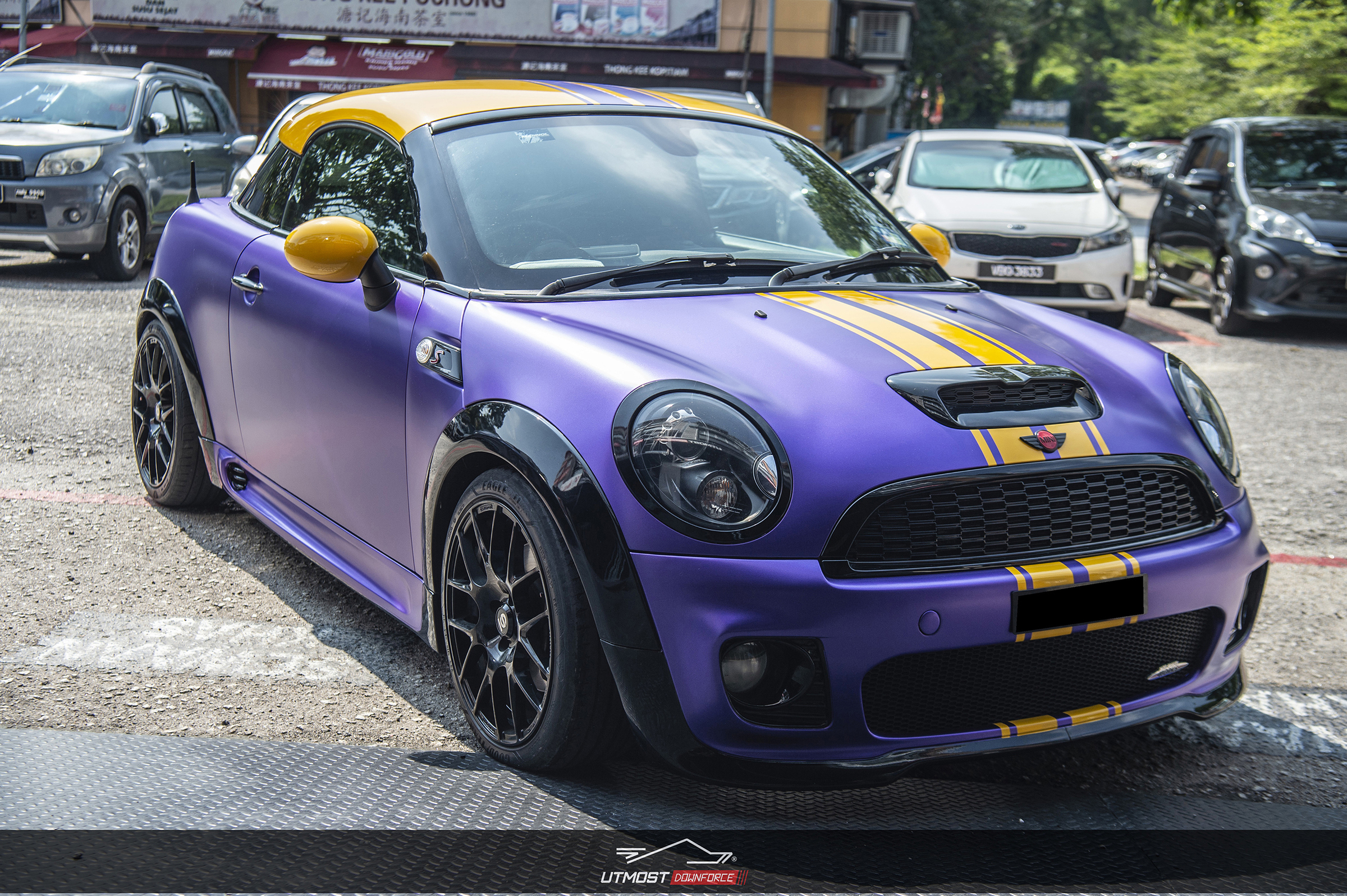 A car wrapped in Satin Metallic Purple, Satin Metallic film by Avery Dennison