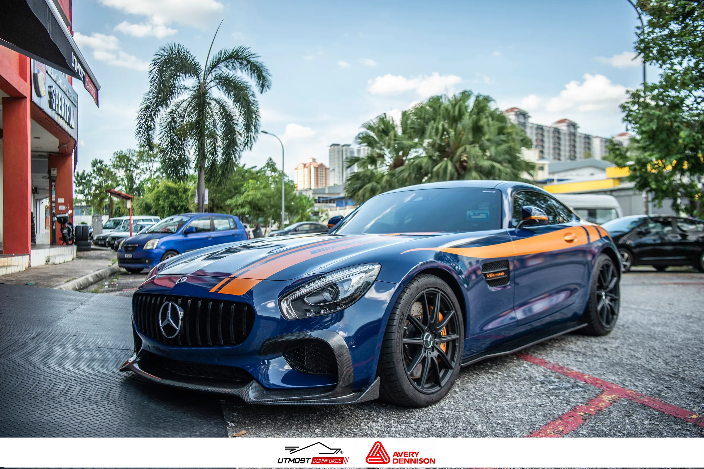 A car wrapped in Gloss Indigo Blue, Gloss Metallic film by Avery Dennison