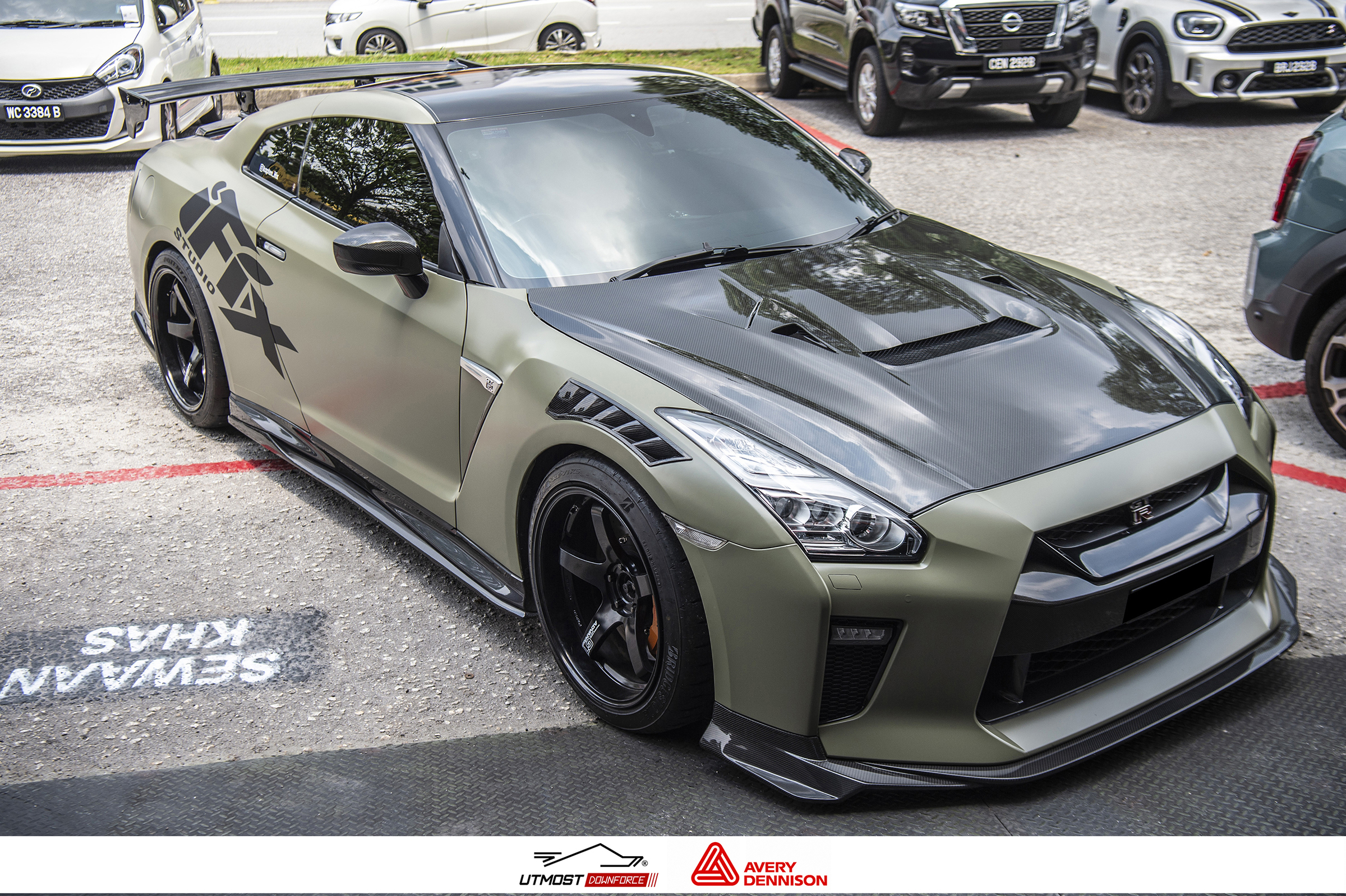 A car wrapped in Satin Khaki Green, Satin film by Avery Dennison