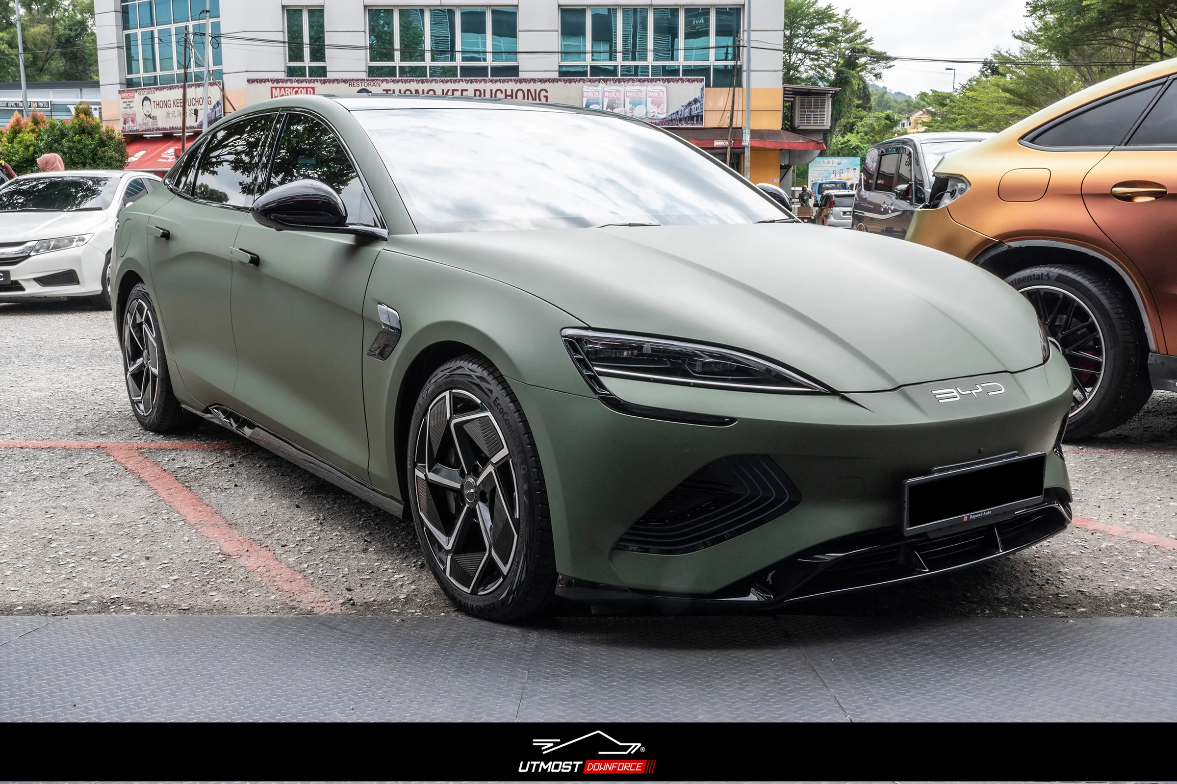 A car wrapped in Matte Olive Green, Matte film by Avery Dennison