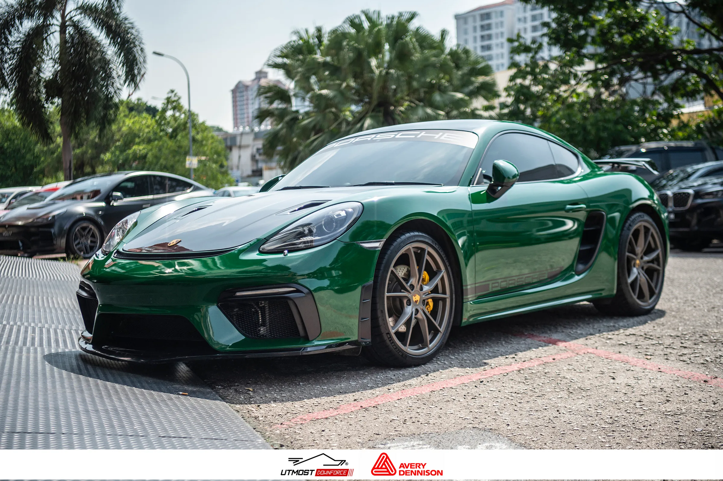 A car wrapped in Gloss Dark Green, Gloss film by Avery Dennison