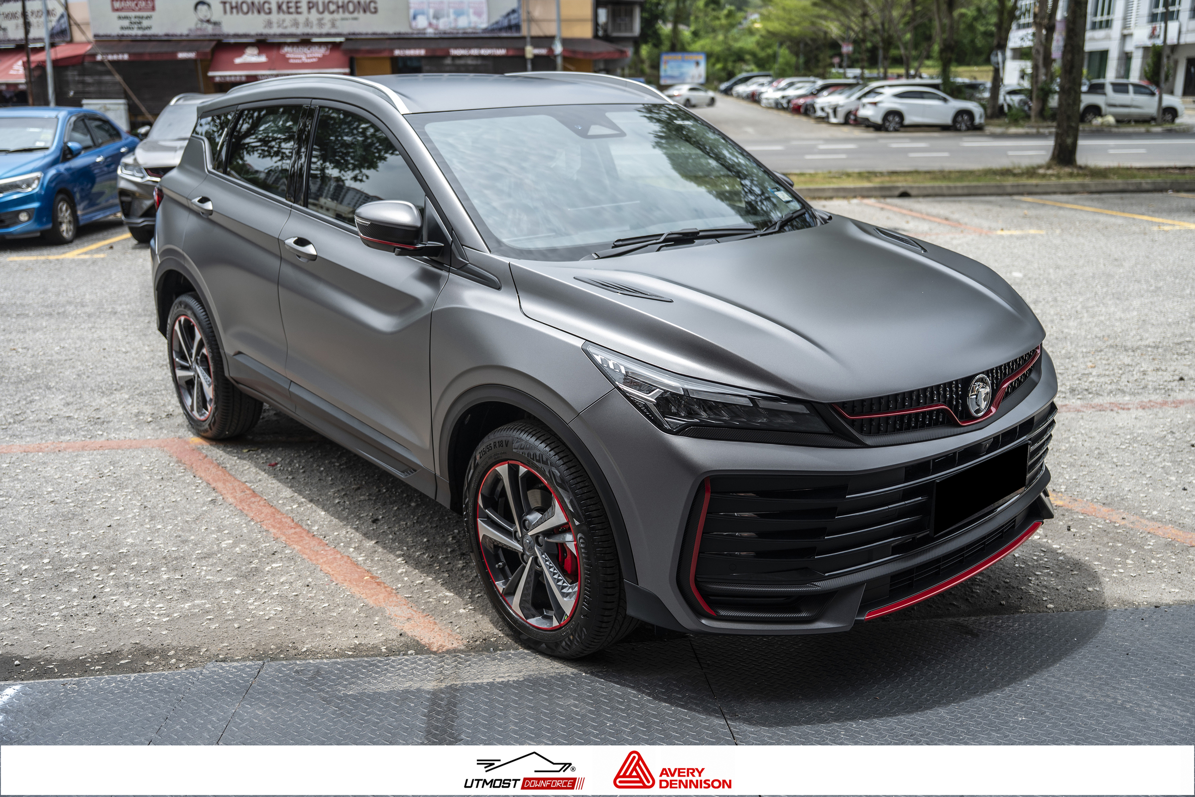 A car wrapped in Satin Charcoal Metallic, Satin Metallic film by Avery Dennison