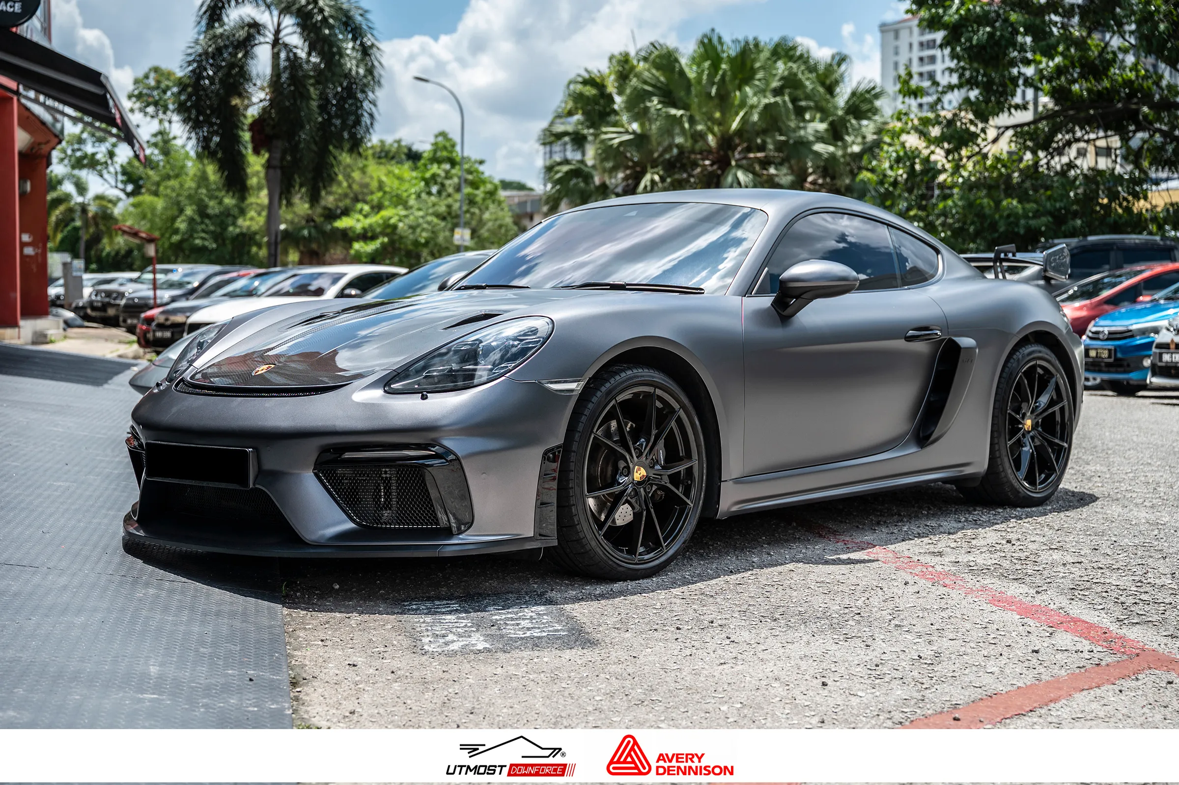 A car wrapped in Satin Dark Grey, Satin Metallic film by Avery Dennison