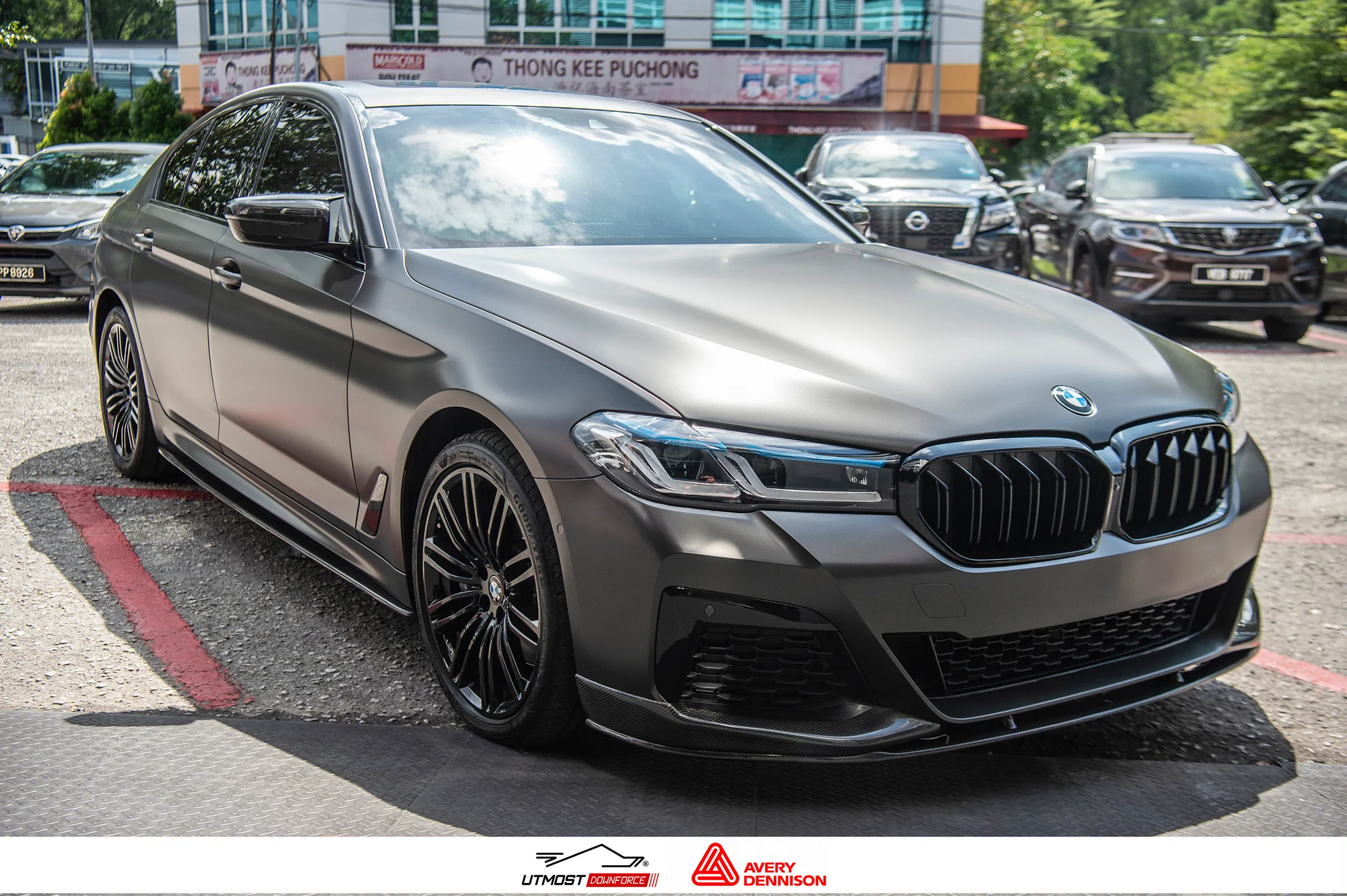 A car wrapped in Satin Dark Basalt, Satin film by Avery Dennison