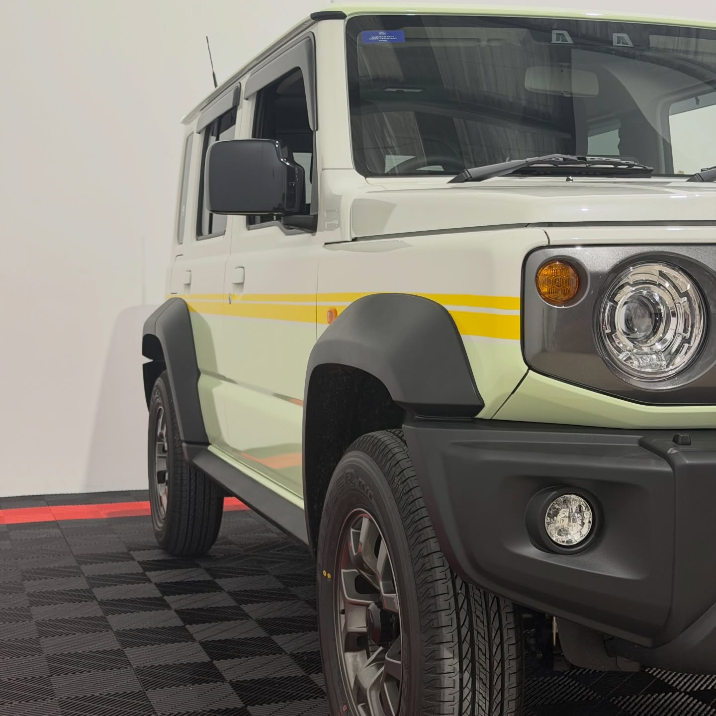 Suzuki Jimny wrapped in Gloss Pistachio Green/Gloss Yellow, shot 6