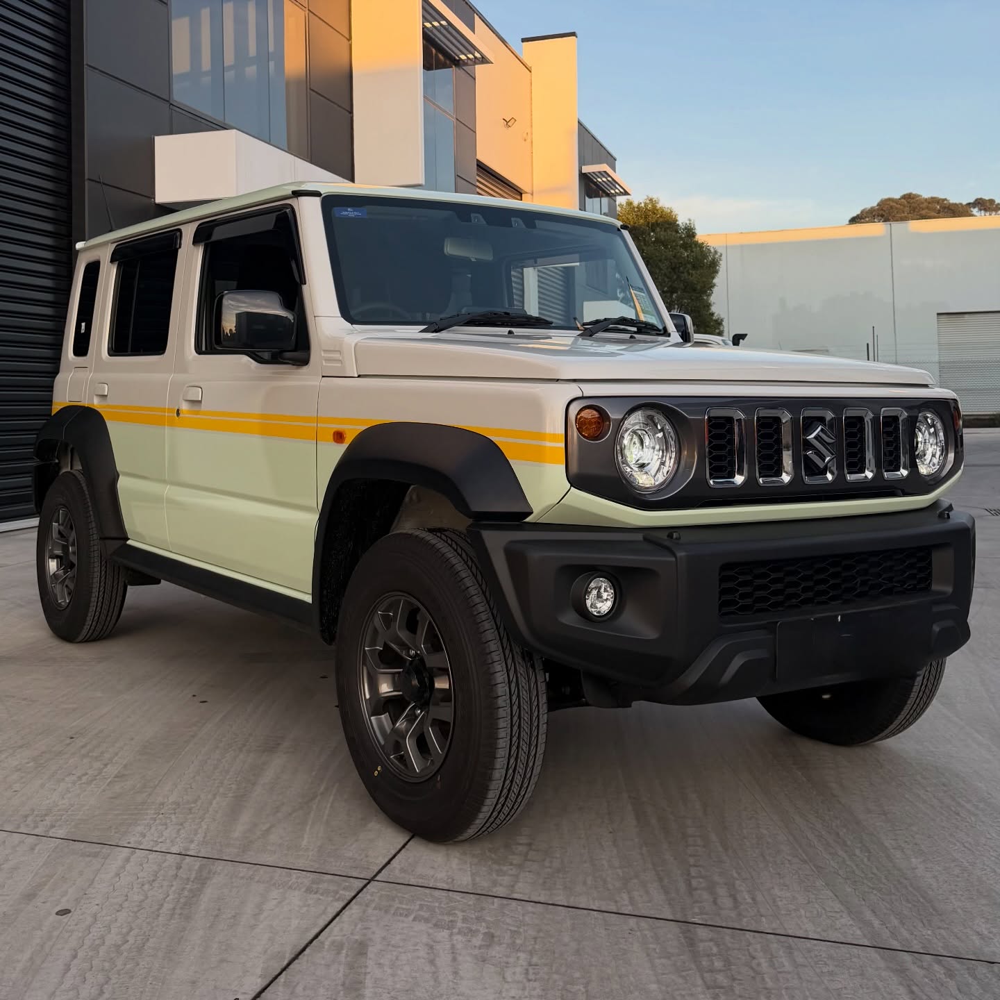 Suzuki Jimny wrapped in Gloss Pistachio Green/Gloss Yellow, shot 3