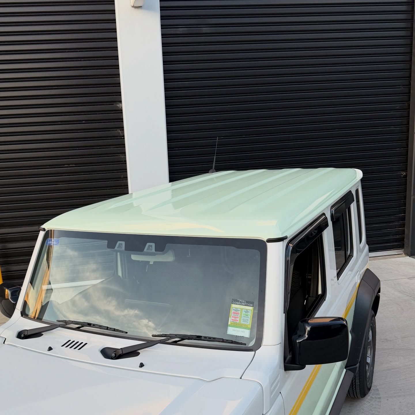 Suzuki Jimny wrapped in Gloss Pistachio Green/Gloss Yellow, shot 4