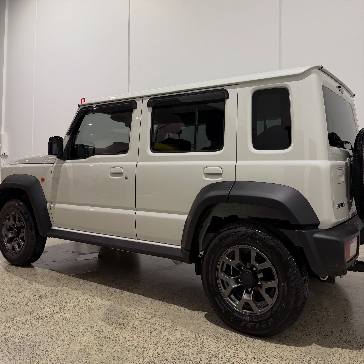 Suzuki Jimny wrapped in Gloss Pistachio Green/Gloss Yellow, shot 10