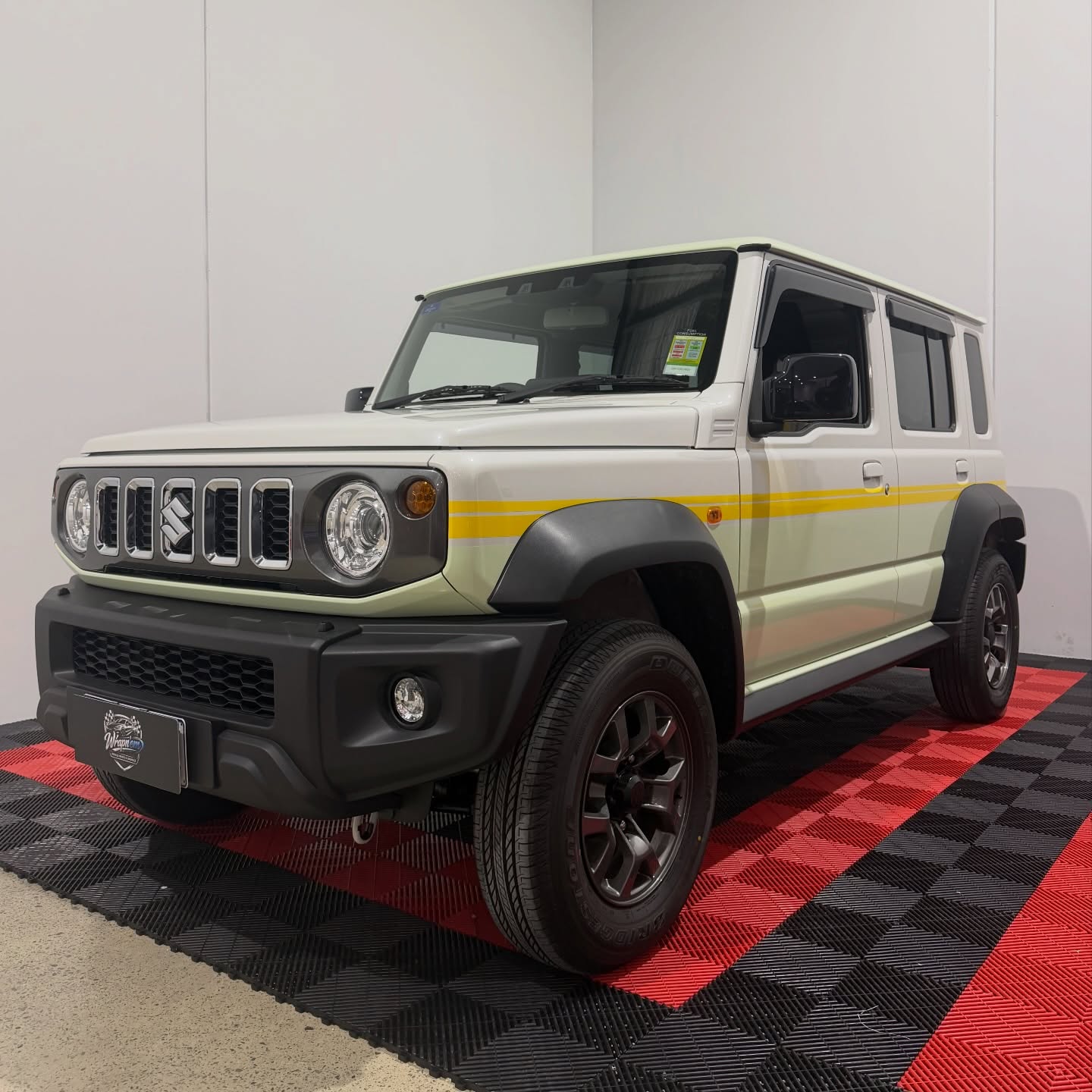 Suzuki Jimny wrapped in Gloss Pistachio Green/Gloss Yellow, shot 7