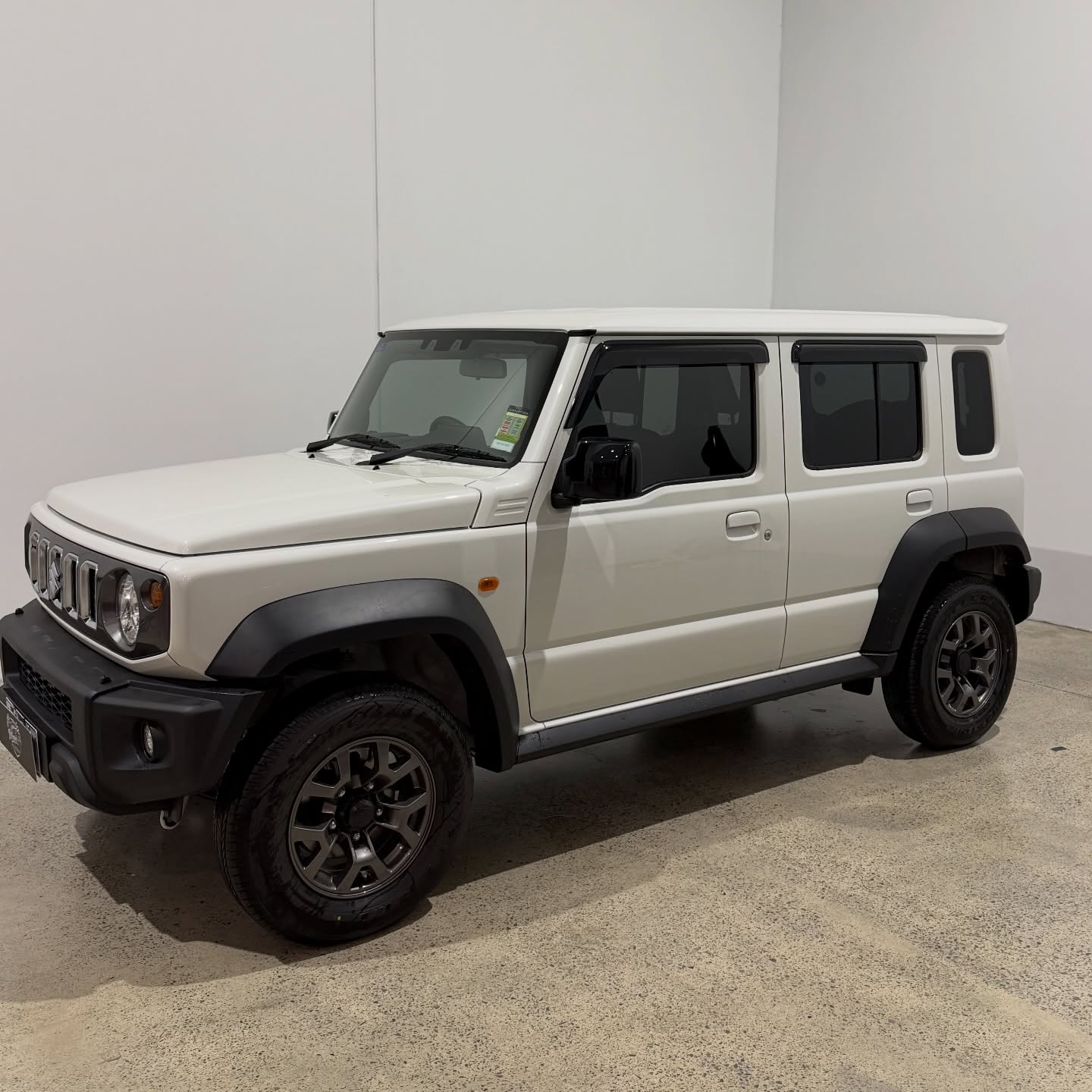 Suzuki Jimny wrapped in Gloss Pistachio Green/Gloss Yellow, shot 9
