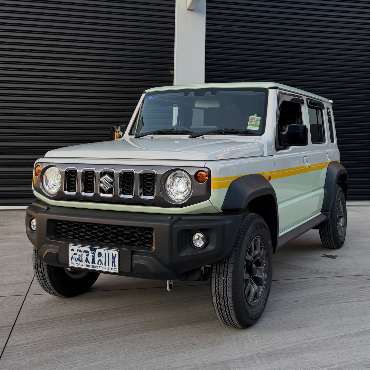 Suzuki Jimny wrapped in Gloss Pistachio Green/Gloss Yellow, shot 2