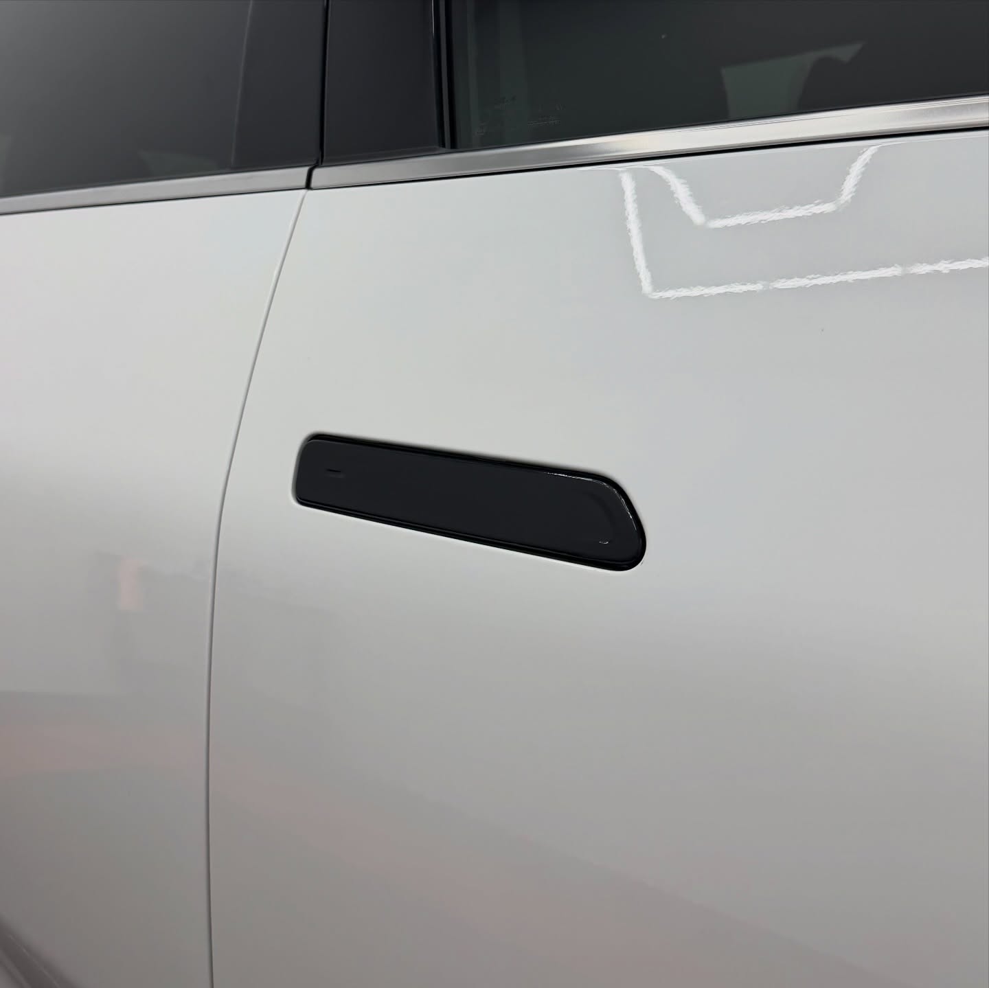 KIA EV5 wrapped in Gloss Obsidian Black, shot 13
