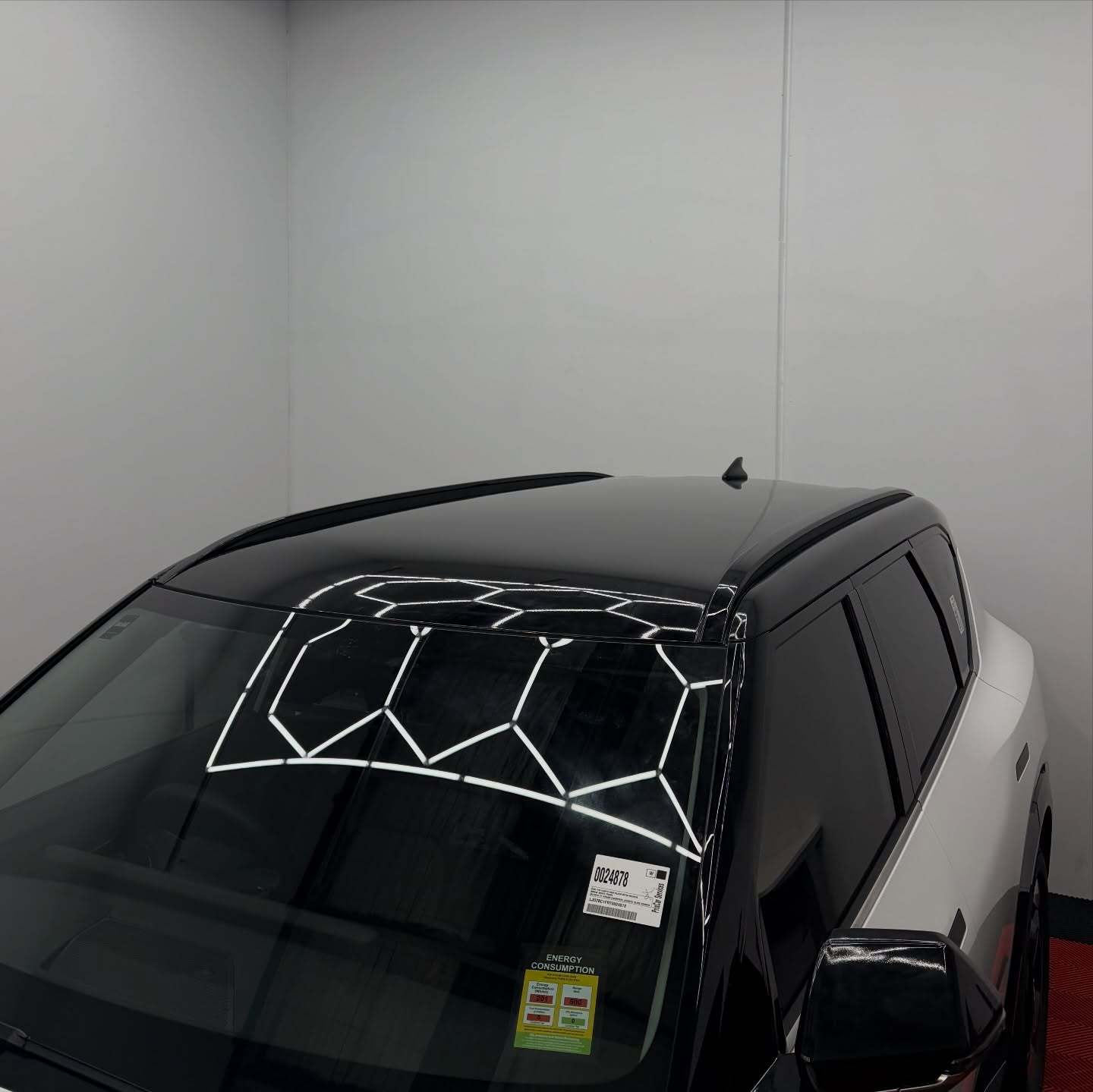 KIA EV5 wrapped in Gloss Obsidian Black, shot 10