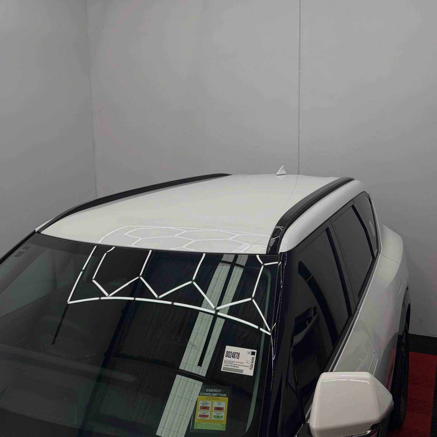 KIA EV5 wrapped in Gloss Obsidian Black, shot 15