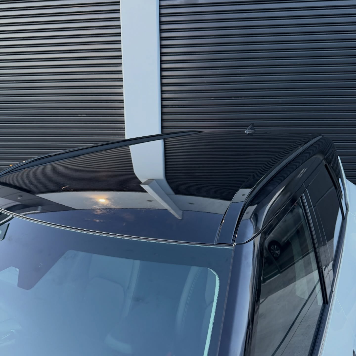 KIA EV5 wrapped in Gloss Obsidian Black, shot 6