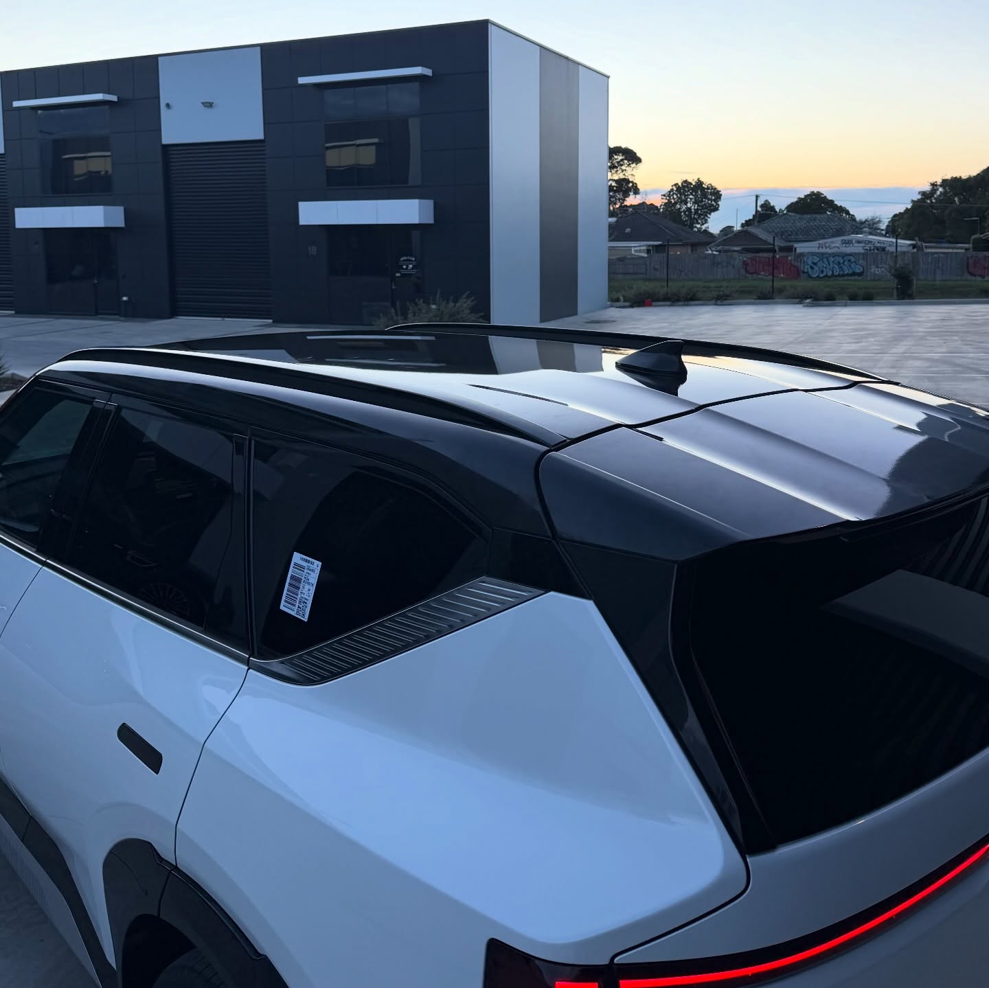 KIA EV5 wrapped in Gloss Obsidian Black, shot 8