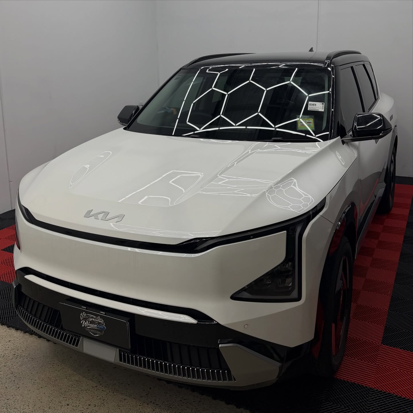 KIA EV5 wrapped in Gloss Obsidian Black, shot 9