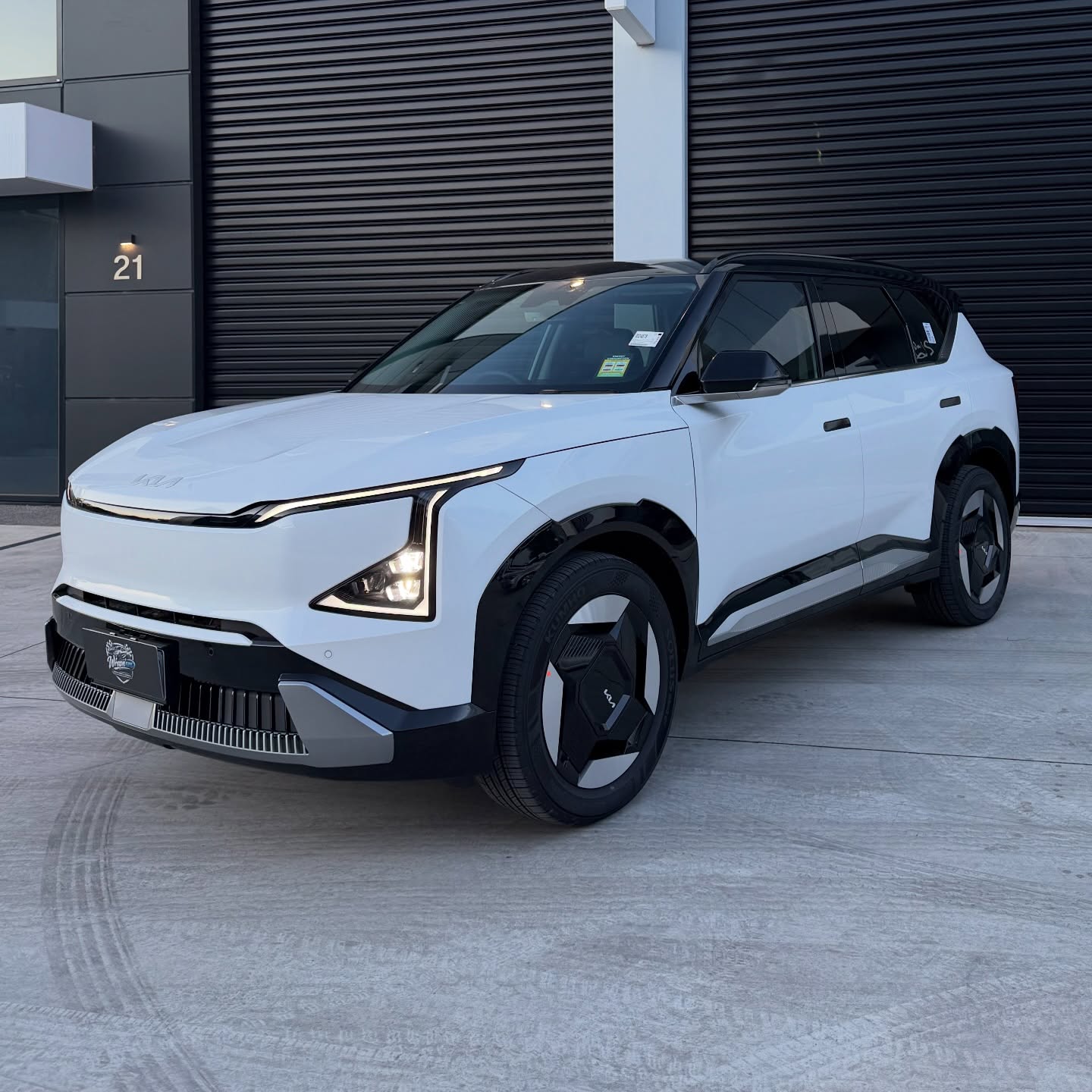 KIA EV5 wrapped in Gloss Obsidian Black, shot 3