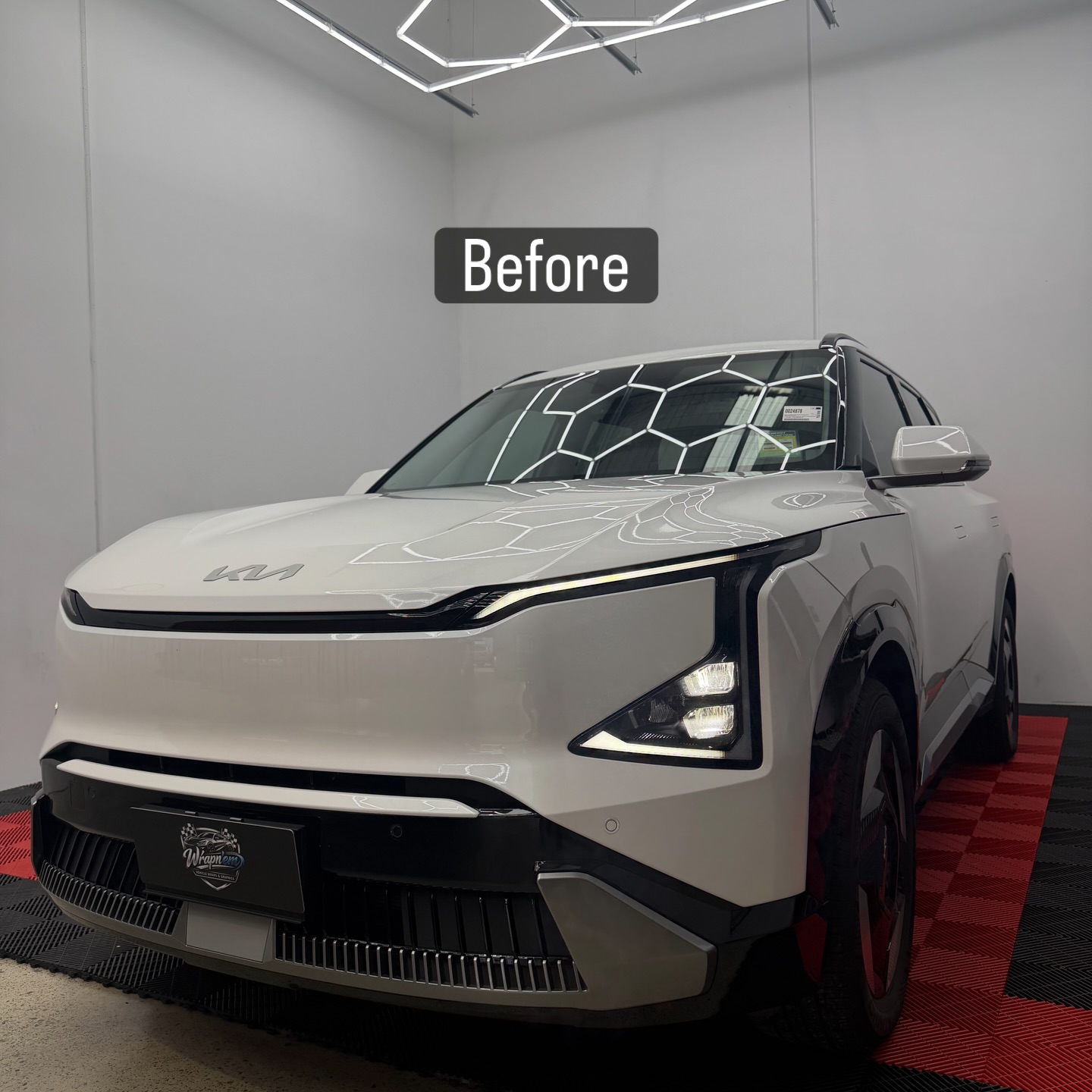 KIA EV5 wrapped in Gloss Obsidian Black, shot 14