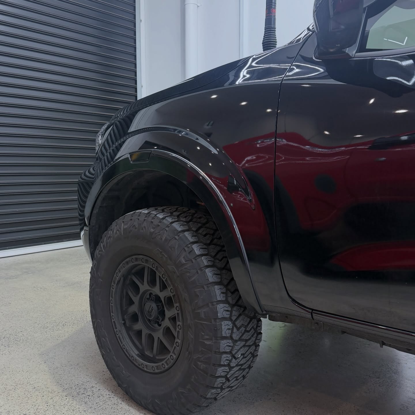 2025 Nissan Navara PRO-4X wrapped in Gloss Obsidian Black, shot 5