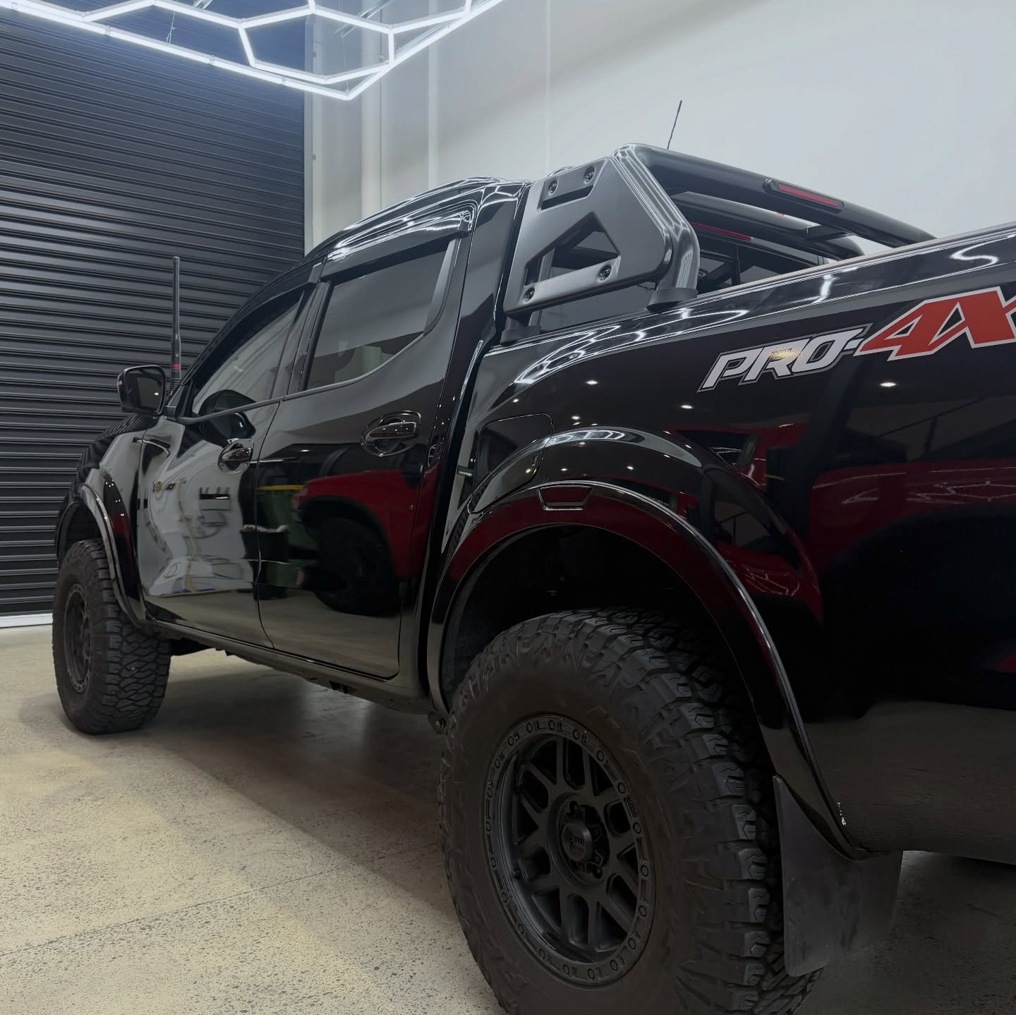 2025 Nissan Navara PRO-4X wrapped in Gloss Obsidian Black, shot 4