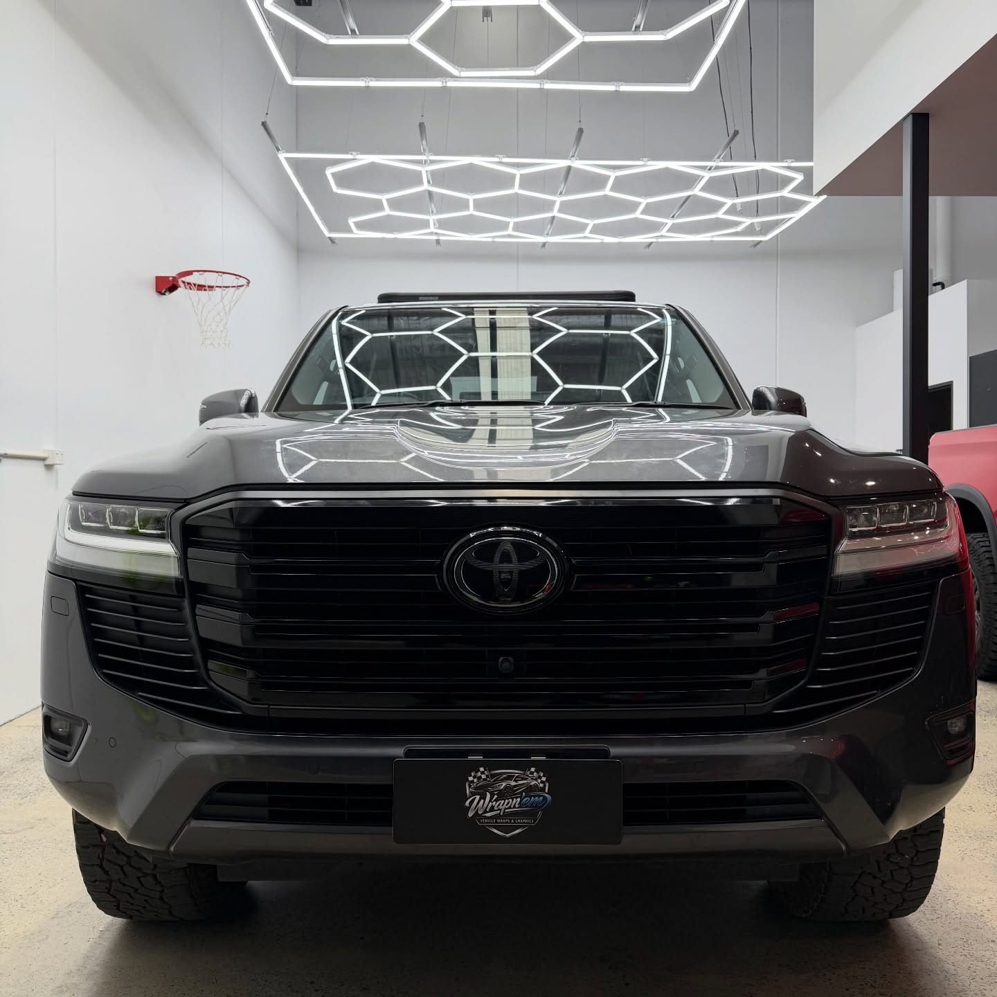 Toyota Land Cruiser 300 Series wrapped in Gloss Obsidian Black, shot 3