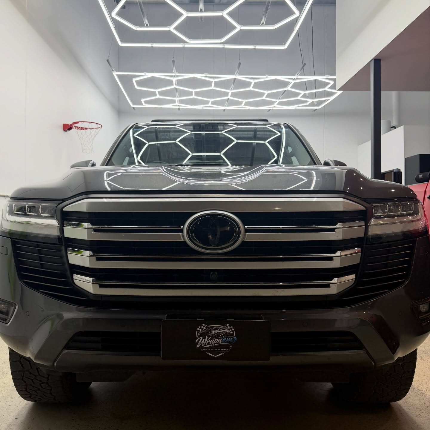 Toyota Land Cruiser 300 Series wrapped in Gloss Obsidian Black, shot 5