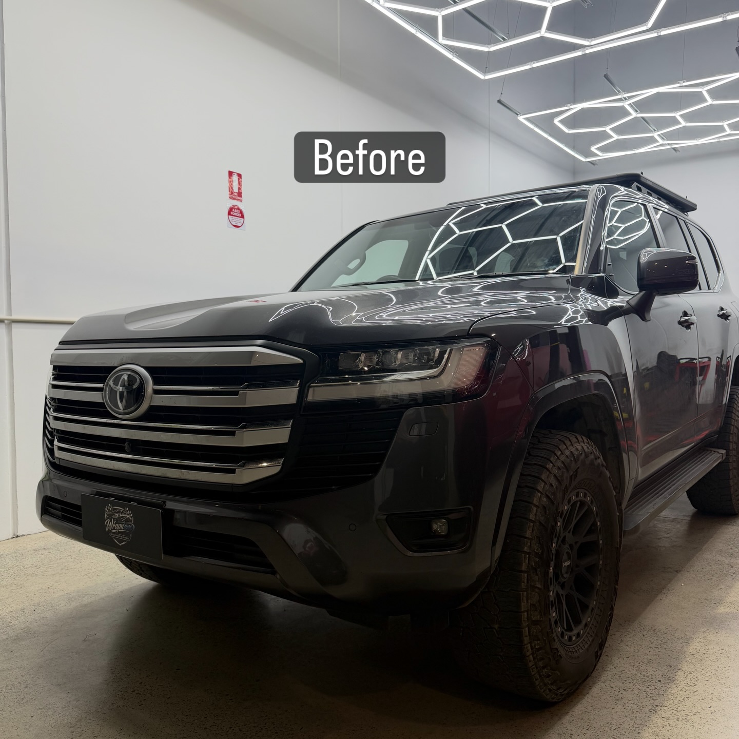Toyota Land Cruiser 300 Series wrapped in Gloss Obsidian Black, shot 4