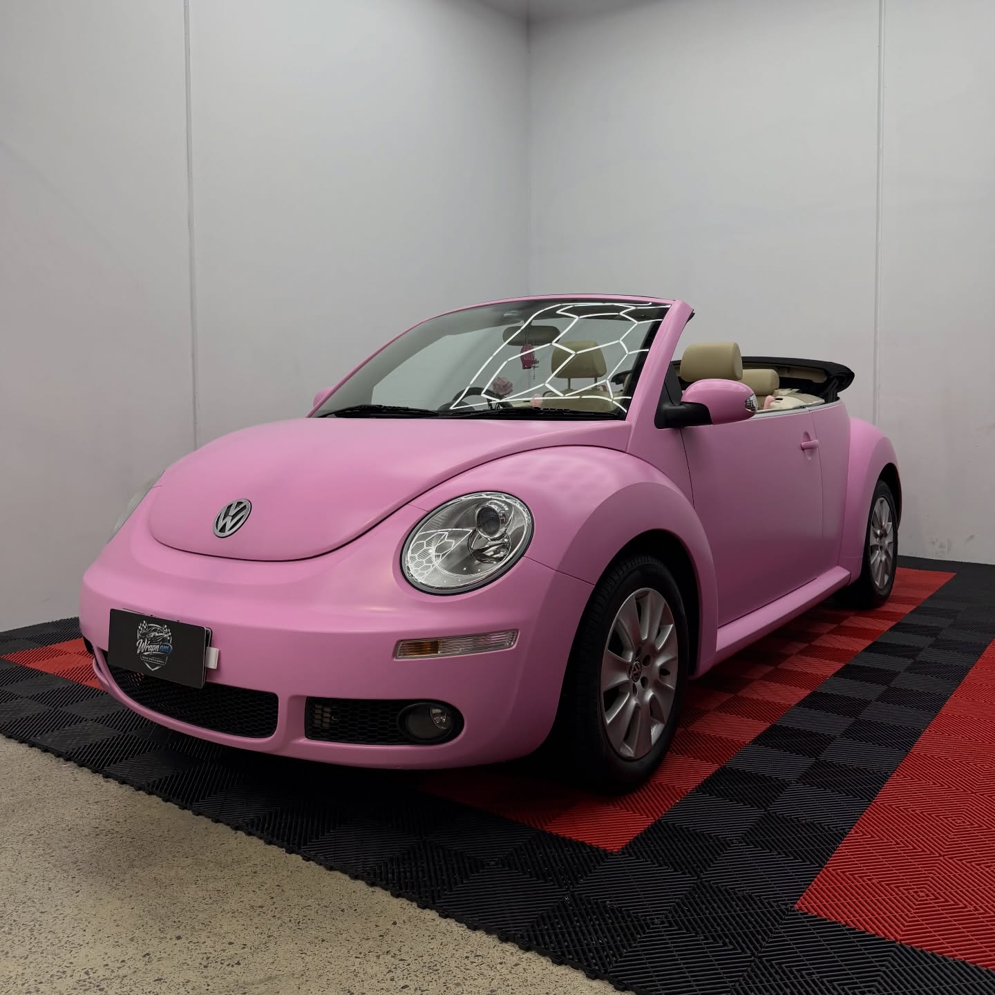 2008 VW Beetle Convertible wrapped in Avery Dennison Satin Bubblegum Pink, shot 3