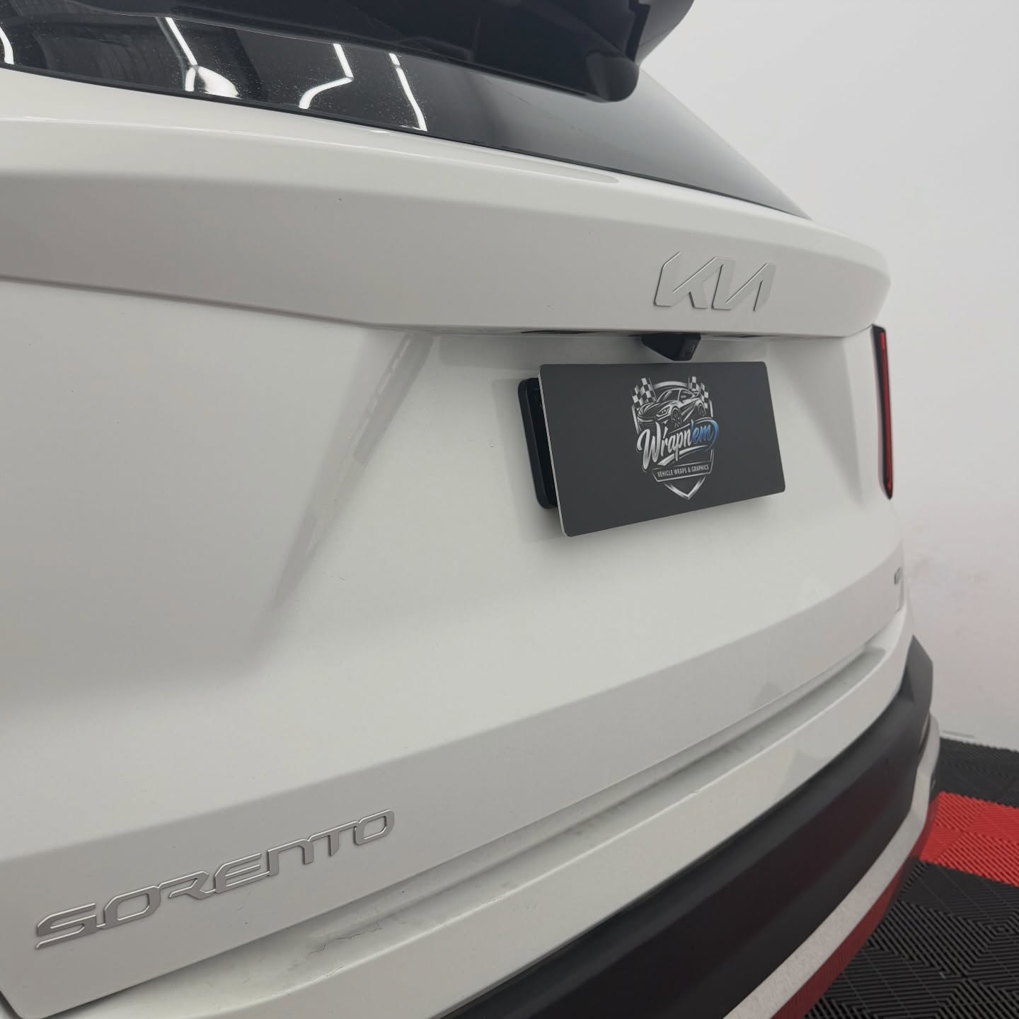 2026 Kia Sorento wrapped in Gloss Obsidian Black, shot 12