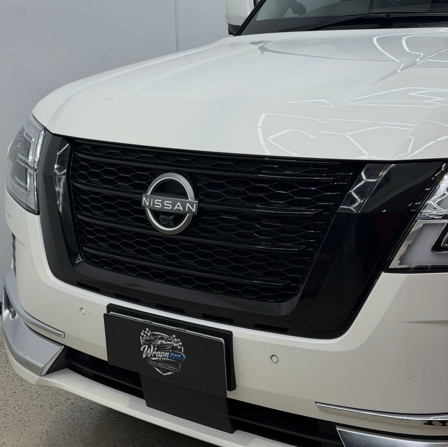 2025 Nissan Patrol Ti-L wrapped in Gloss Obsidian Black, shot 3