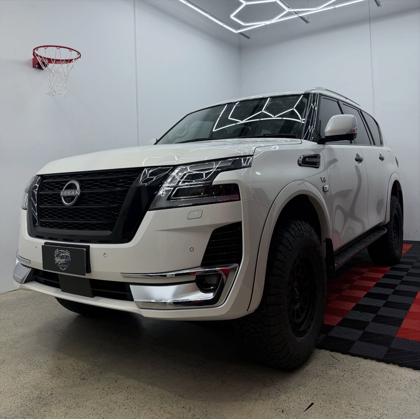 2025 Nissan Patrol Ti-L wrapped in Gloss Obsidian Black, shot 2