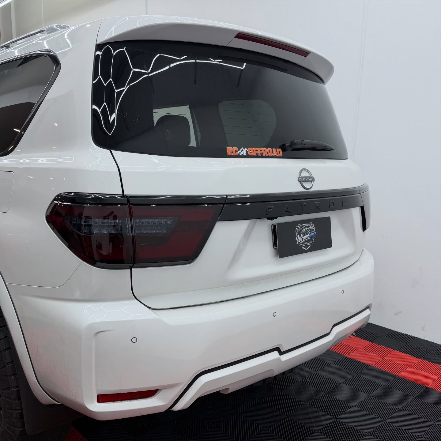 2025 Nissan Patrol Ti-L wrapped in Gloss Obsidian Black, shot 7