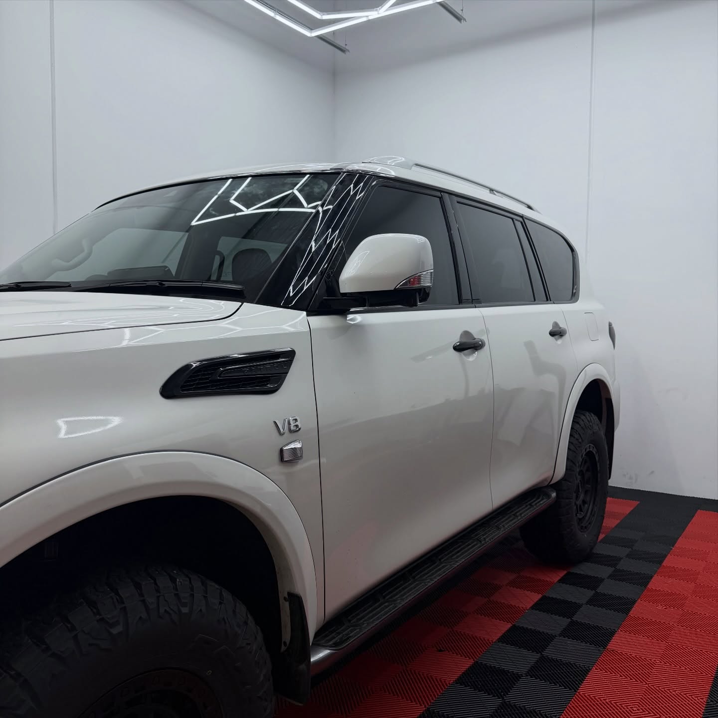 2025 Nissan Patrol Ti-L wrapped in Gloss Obsidian Black, shot 4