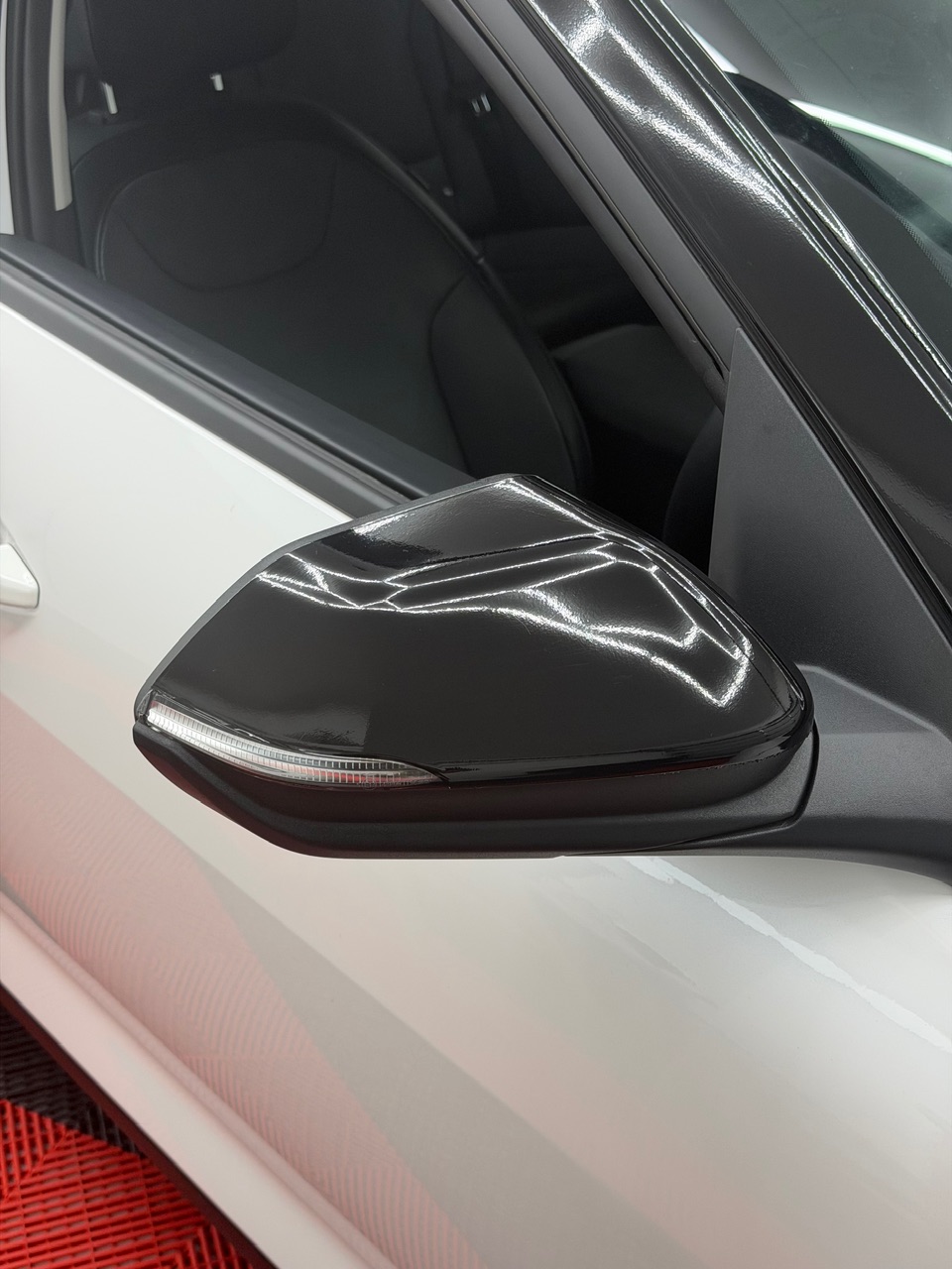 2025 Kia K4 wrapped in Gloss Obsidian Black, shot 2